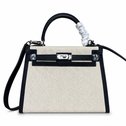 Top Selling Kelly 25 Bag With Outside Stitching, Made Of Textured Canvas & Soft Swift Leather Patchwork, Classic Black Silver Hardware Combination, Stunning Mixed Material Texture Dimensions: Length 25 * Width 10 * Height 18cm