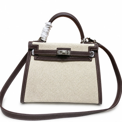 Kelly 25 Bag With Exterior Stitching Crafted Of Patchwork Canvas & Premium Swift Leather, Classic Deep Ebony Wood Shade, Unique Mixed Material Texture With Distinct Vintage Charm Dimensions: Length 25 * Width 10 * Height 18cm