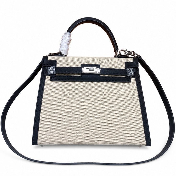 Top Selling Kelly 25 Bag With Outside Stitching, Made Of Textured Canvas & Soft Swift Leather Patchwork, Classic Black Silver Hardware Combination, Stunning Mixed Material Texture Dimensions: Length 25 * Width 10 * Height 18cm
