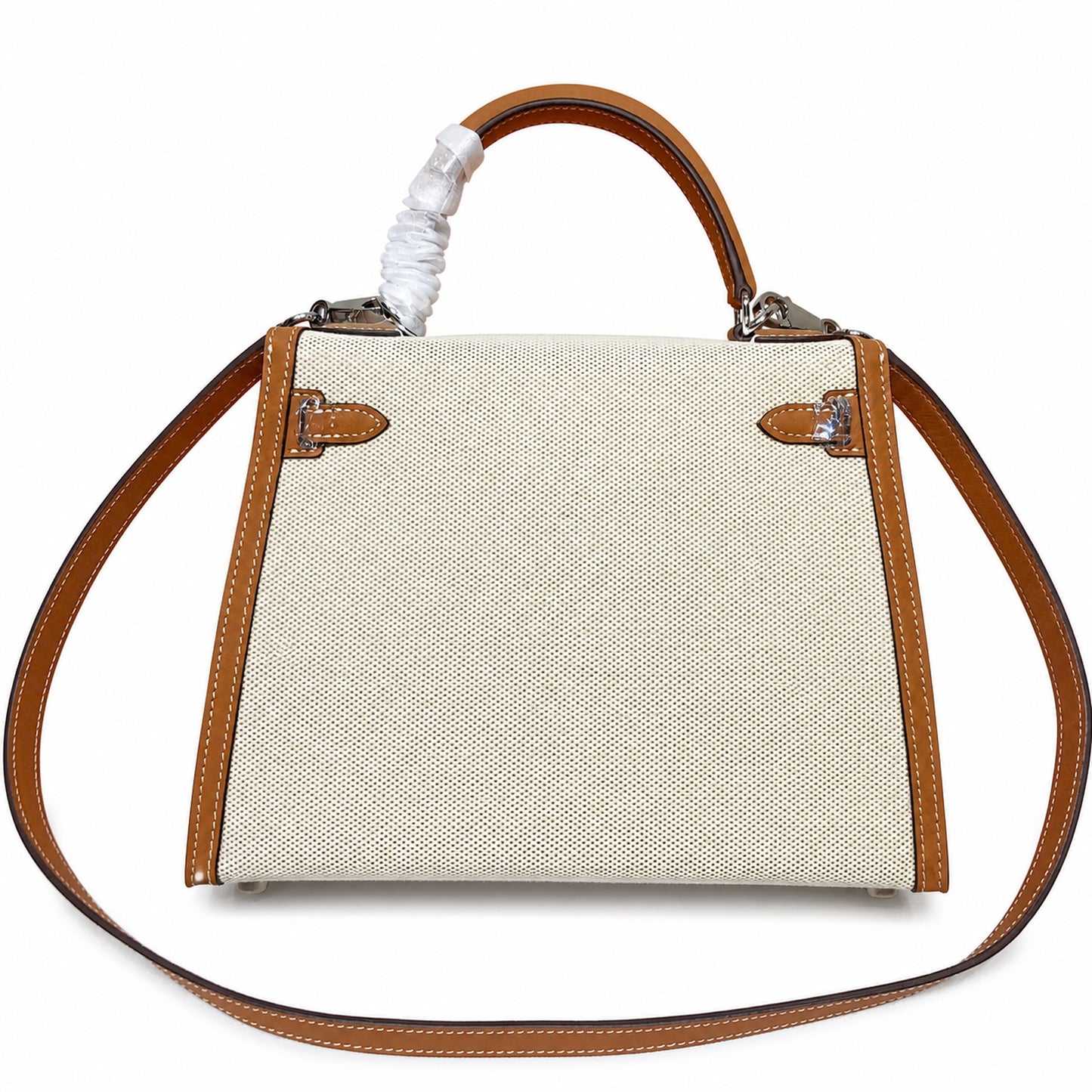 Kelly 25 Bag With Outside Stitching Constructed Of Patchwork Canvas & Premium Soft Swift Leather, Rich Warm Brown Tone Delivers Full-Bodied Vintage Luxury Texture Dimensions: Length 25 * Width 10 * Height 18cm