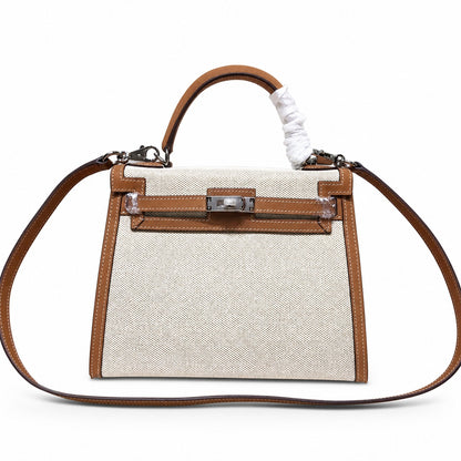 Kelly 25 Bag With Outside Stitching Constructed Of Patchwork Canvas & Premium Soft Swift Leather, Rich Warm Brown Tone Delivers Full-Bodied Vintage Luxury Texture Dimensions: Length 25 * Width 10 * Height 18cm