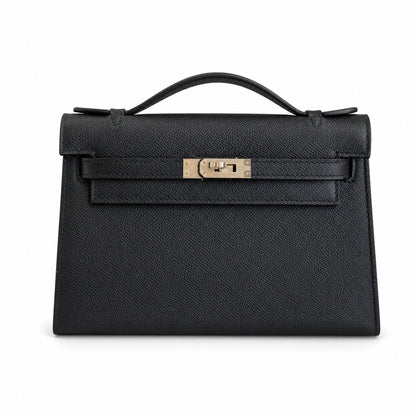 First generation handbag evening bag Kelly 22cm Epsom leather black silver buckle wax thread