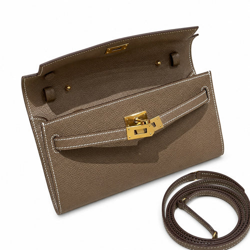 Style: Kelly to go Color: ck18/etoupe Size: 19*11.5*1.5cm Leather: epsom From France Hardware: gold Kelly shoulder crossbody bag, elephant gray, cowhide, gold buckle, high-end handmade exclusive custo
