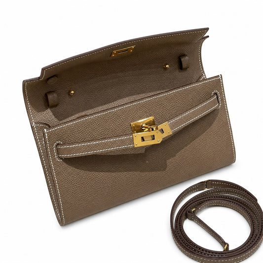 Style: Kelly to go Color: ck18/etoupe Size: 19*11.5*1.5cm Leather: epsom From France Hardware: gold Kelly shoulder crossbody bag, elephant gray, cowhide, gold buckle, high-end handmade exclusive custo