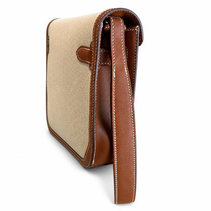 Kelly Depeches 25 clutch, canvas and swift leather (with additional shoulder strap), can be carried cross-body, can be carried by hand or on the wrist, daily needs, seamless switching between business