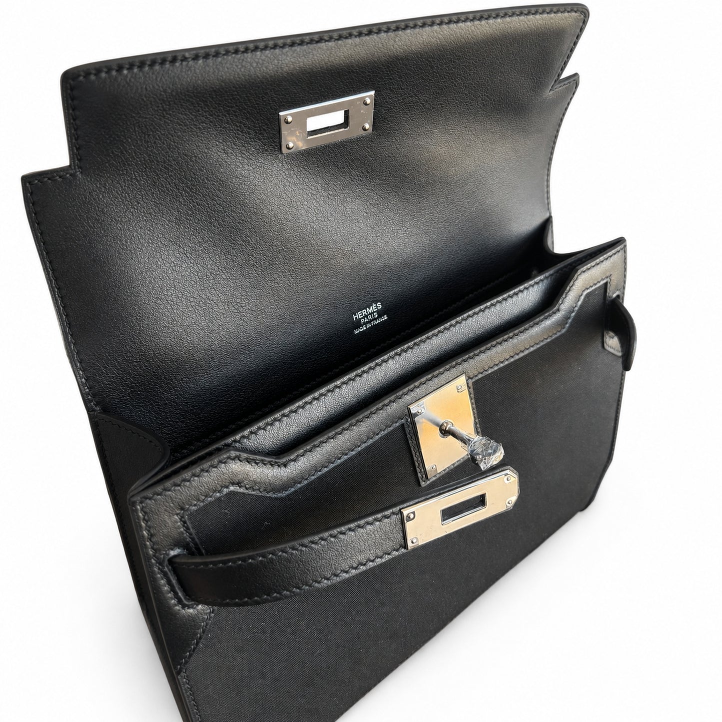 Kelly Depeches 25 clutch, canvas and swift leather (with additional shoulder strap), can be carried cross-body, can be carried by hand or on the wrist, daily needs, seamless switching between business