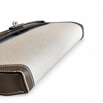 Kelly Depeches 25 clutch, canvas and swift leather (with additional shoulder strap), can be carried cross-body, can be carried by hand or on the wrist, daily needs, seamless switching between business